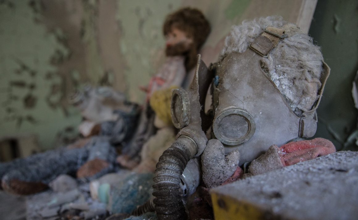 Chernobyl disaster, abandoned, gas masks, decay, nuclear catastrophe, ruins, desolation, eerie, dusty, haunted, aftermath, radioactive contamination, abandonment, Pripyat, Ukraine, Soviet Union, tragedy, exclusion zone, forgotten relics