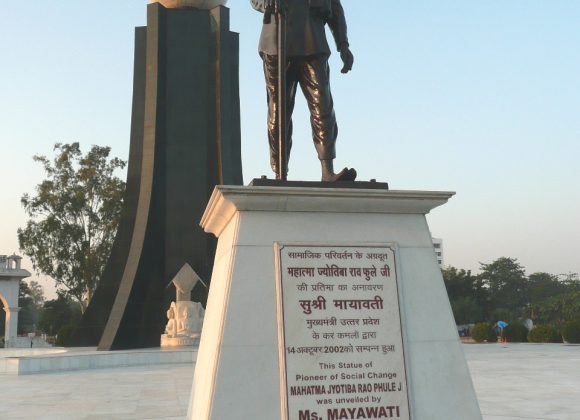 Mahatma Jyotirao Phule, statue, social reformer, education advocate, caste discrimination, Mayawati, Uttar Pradesh, inauguration plaque, globe sculpture, public monument.