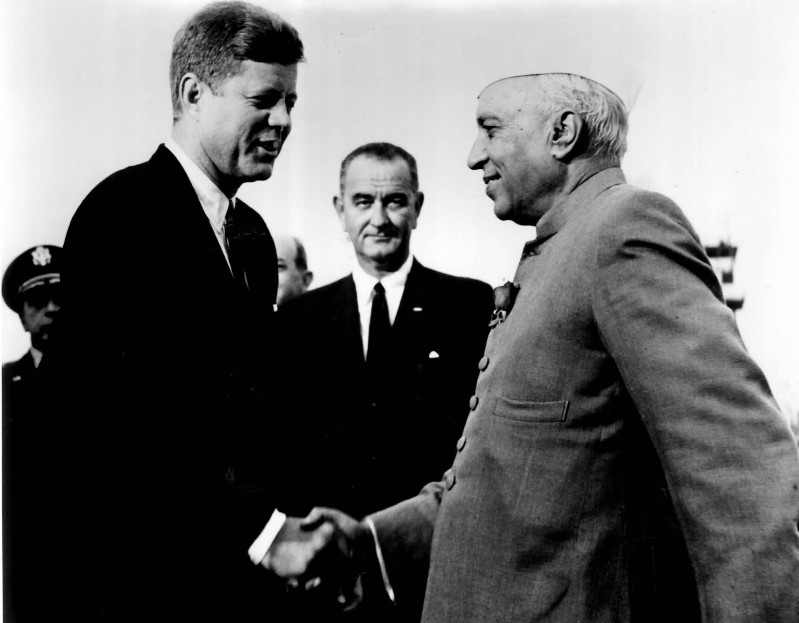 Jawaharlal Nehru, John F. Kennedy, Lyndon B. Johnson, India US relations, Cold War diplomacy, Nehru visit to America, 1961 New York visit, United States foreign policy, Indian foreign policy history, Nehru Kennedy meeting, diplomatic handshake, historical photograph, Indian Prime Minister, US President, Indo American relations