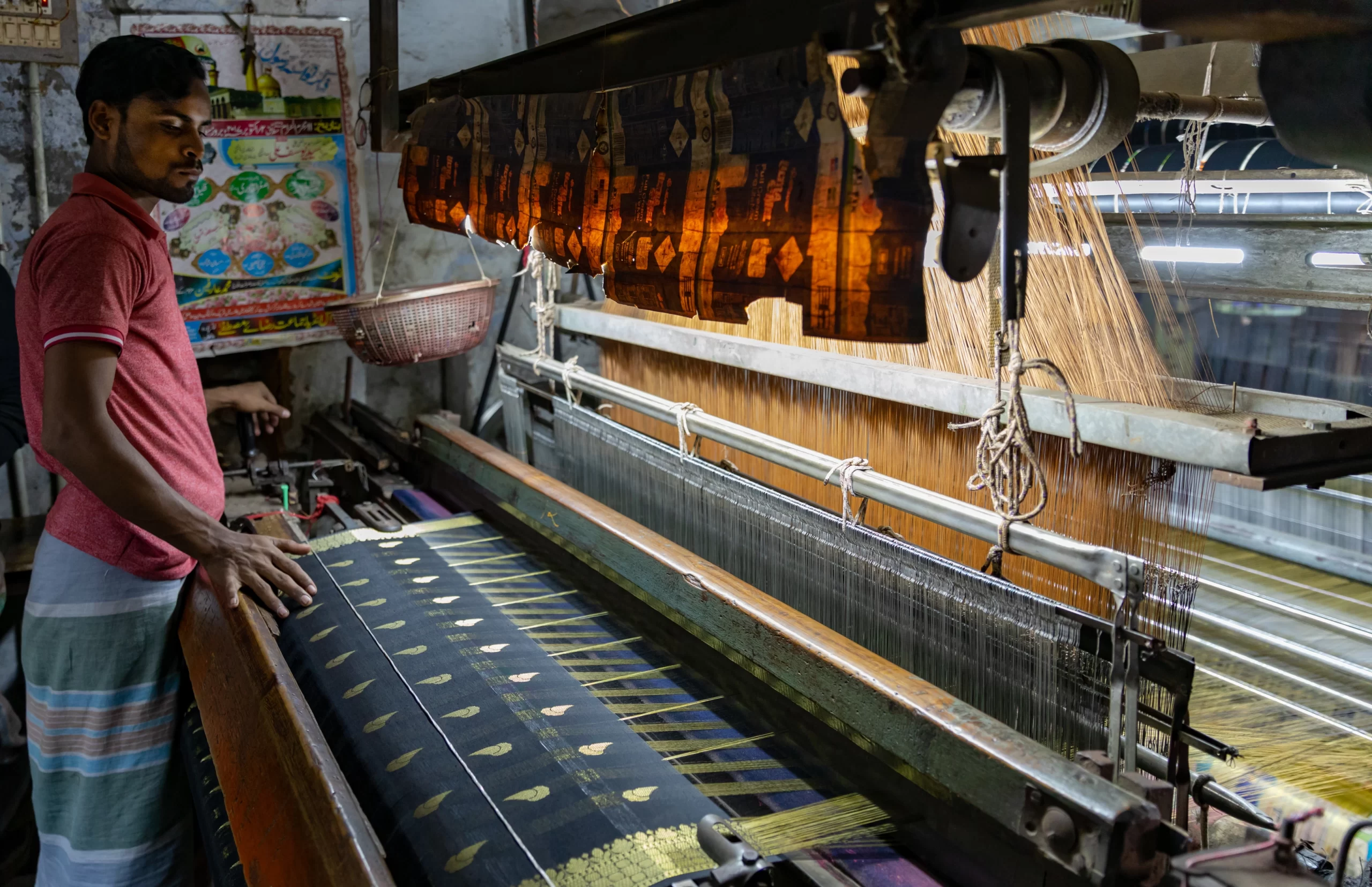 Indian weaver, Banarasi saree, textile craftsmanship, silk weaving, traditional loom, cultural heritage, artisan skill, handwoven fabric, Indian Textile Art History, textile workshop.