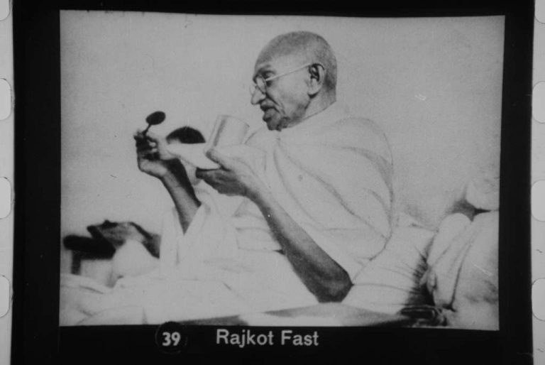 Gandhi's Personal Ideologies, Mahatma Gandhi, Rajkot fast, non-violent protest, Indian history, fasting, civil disobedience, Gandhi's philosophy, historical photograph, black and white image, Gandhi's fasts, Indian independence movement, political activism, ethical protest, Rajkot, moral conviction.